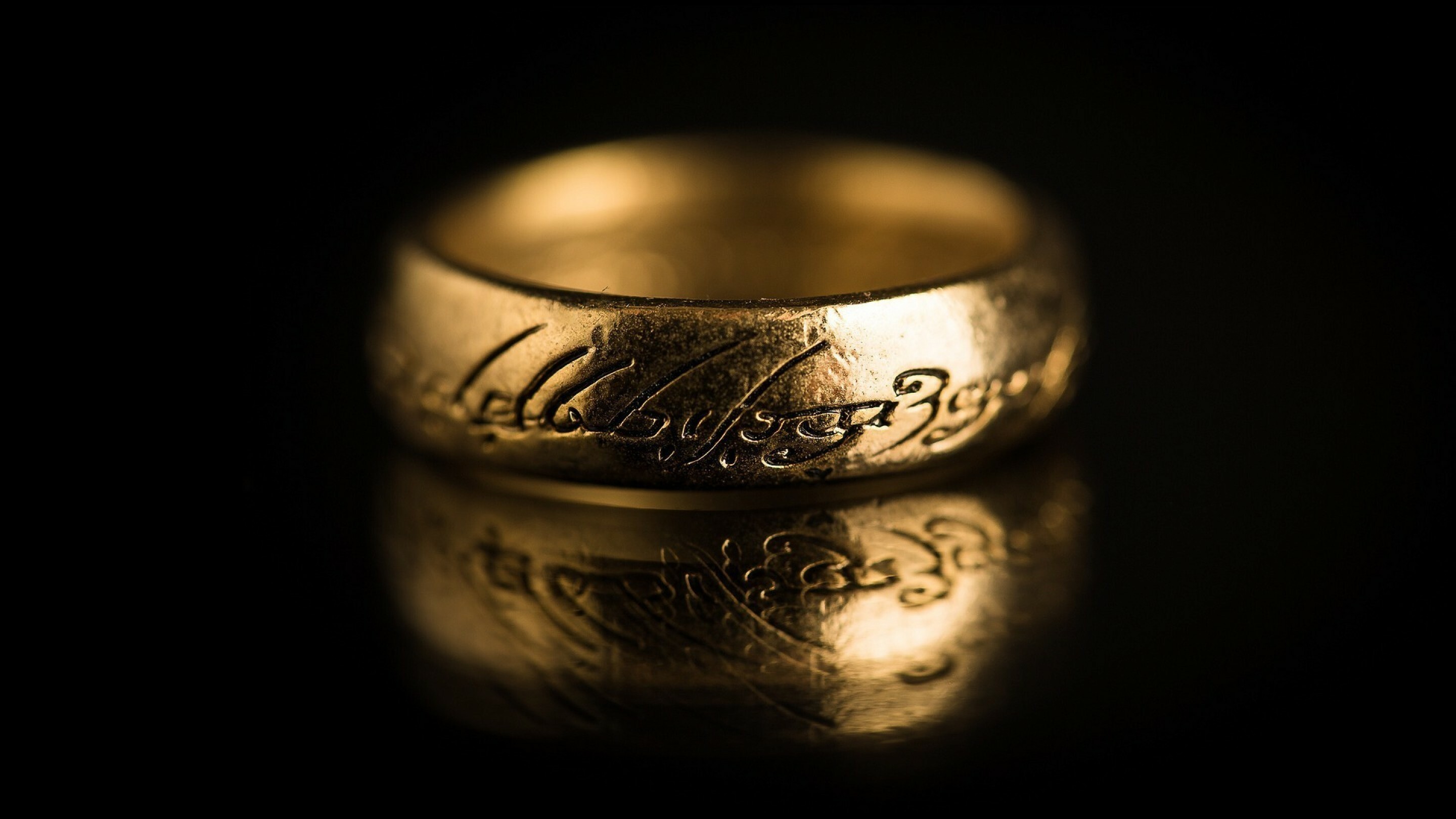 The One Ring, Engraved Elvish Tengwar inscription, Black reflective surface The One Ring, Engraved Elvish Tengwar inscription, Black reflective surface — 2880×1620 HD wallpaper