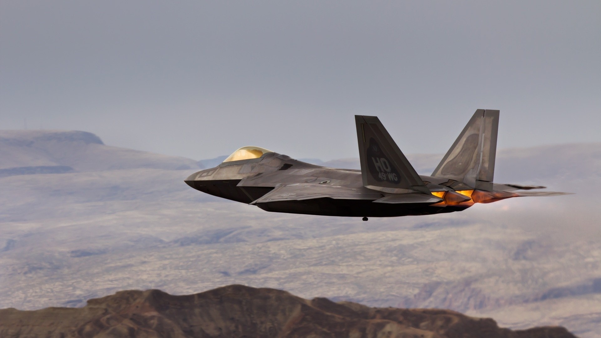 Lockheed Martin F-22 Raptor, Afterburner low pass, Desert mountain backdrop Lockheed Martin F-22 Raptor, Afterburner low pass, Desert mountain backdrop — 1920×1080 HD wallpaper