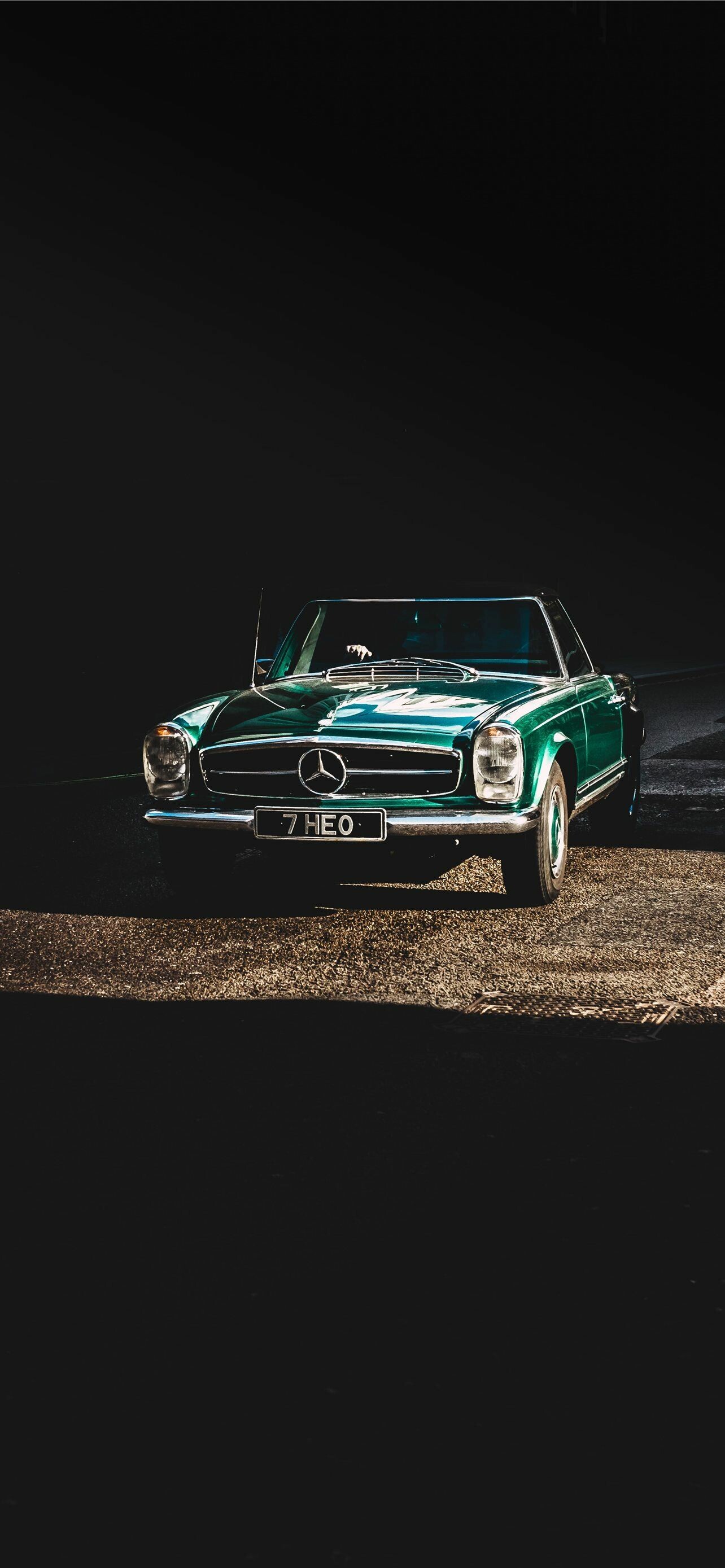 Green Mercedes-Benz 280SL Pagoda W113, Classic chrome grille, Spotlit night tarmac Green Mercedes-Benz 280SL Pagoda W113, Classic chrome grille, Spotlit night tarmac — 1284×2778 HD wallpaper