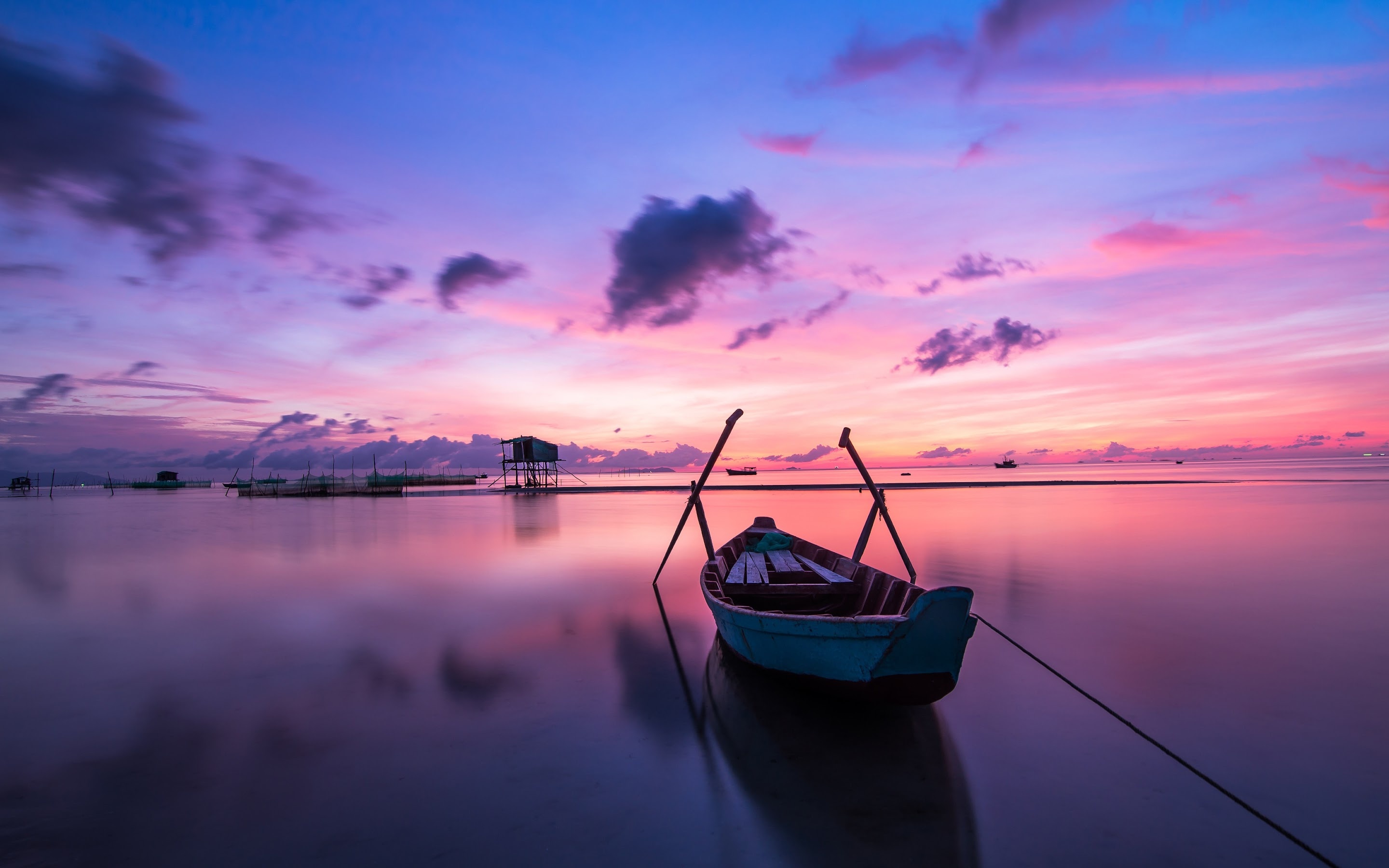 Wooden rowboat, Pink sunset sky, Calm reflective sea Wooden rowboat, Pink sunset sky, Calm reflective sea — 2880×1800 HD wallpaper