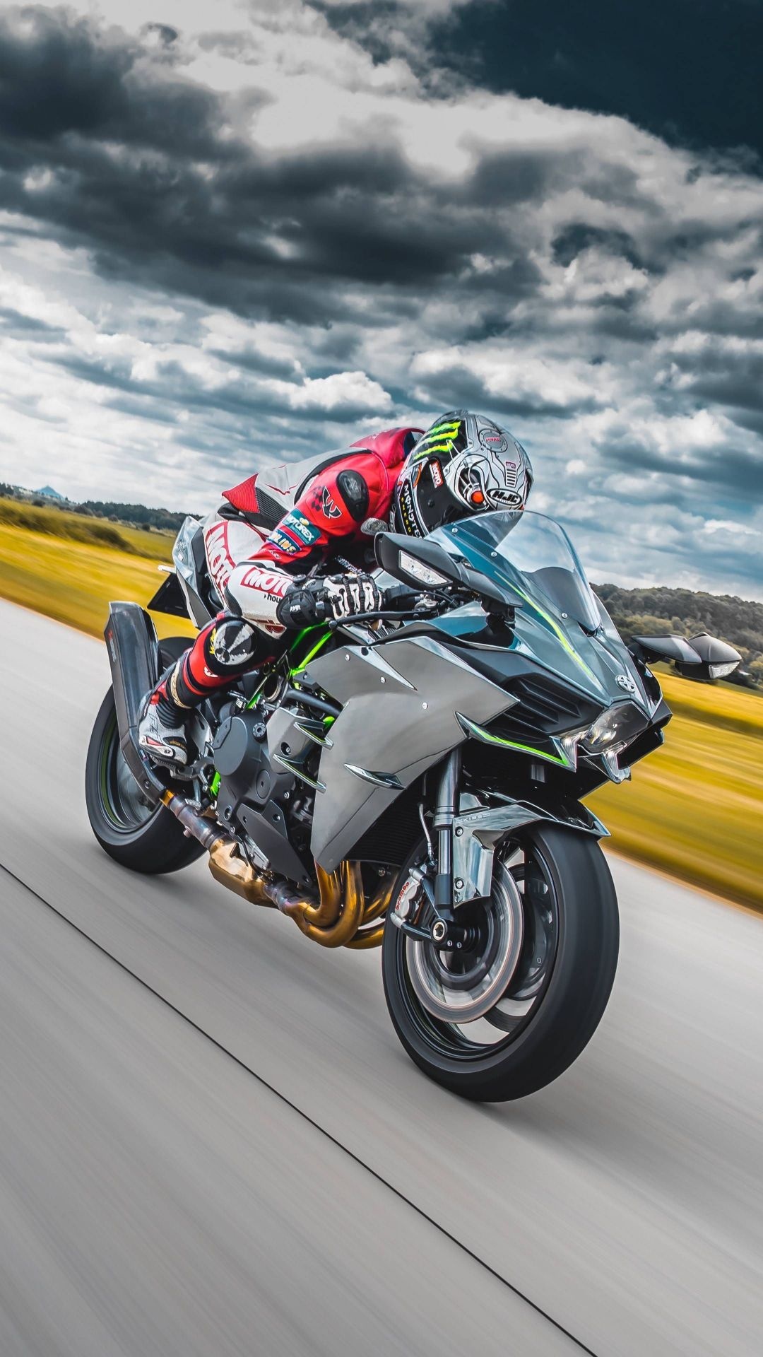 Kawasaki Ninja H2R wheelie, Rider on runway, Cloudy sky Kawasaki Ninja H2R wheelie, Rider on runway, Cloudy sky — 1080×1920 HD wallpaper