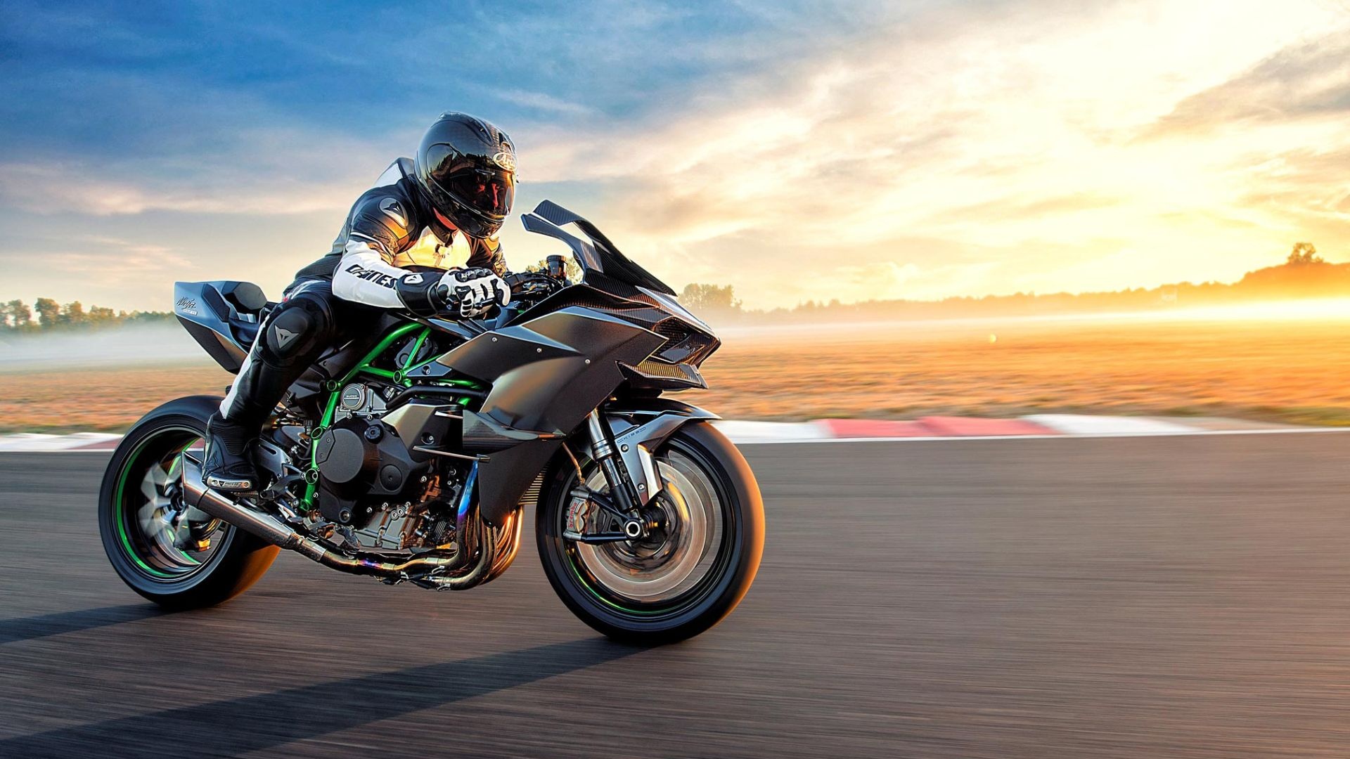 Kawasaki Ninja H2R, Rider cornering on racetrack, Sunset golden glow Kawasaki Ninja H2R, Rider cornering on racetrack, Sunset golden glow — 1920×1080 HD wallpaper