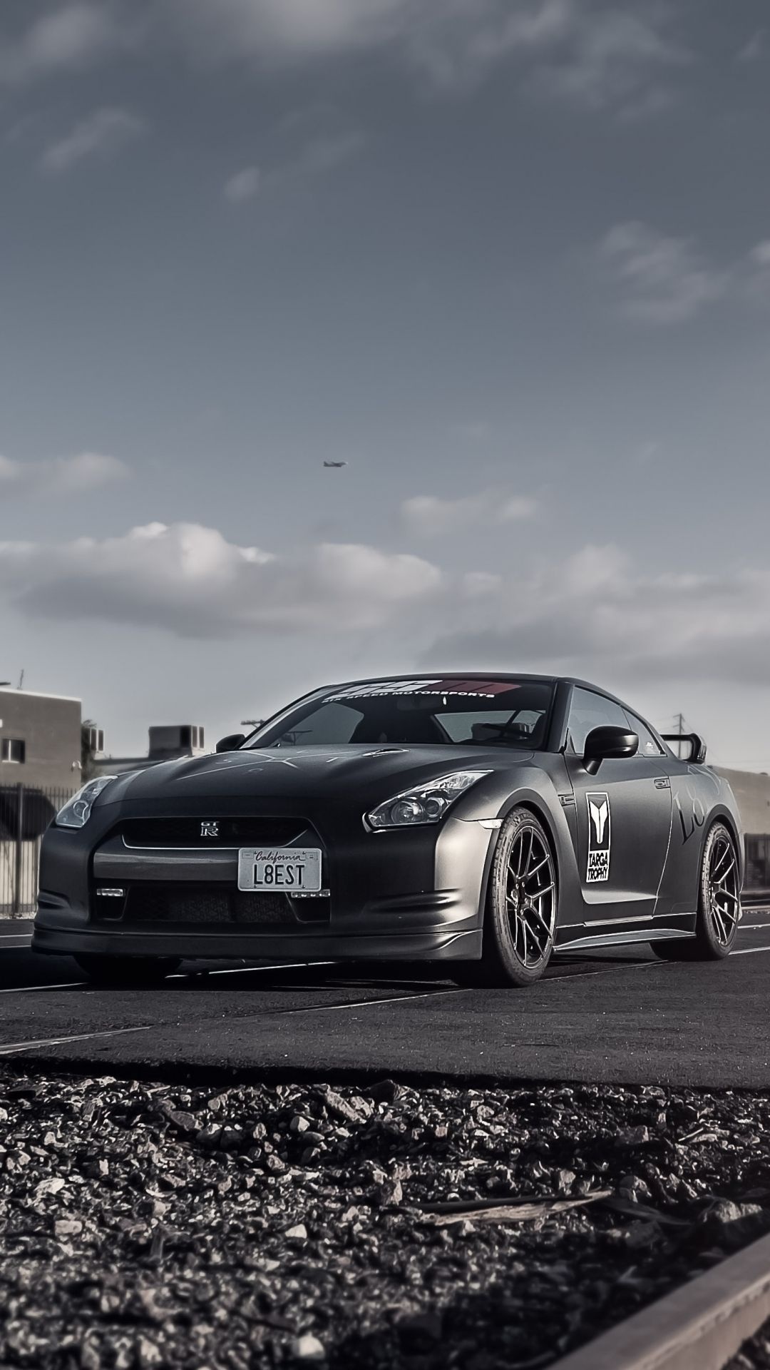 Nissan GT-R R35, Railroad track setting, Matte grey coupe Nissan GT-R R35, Railroad track setting, Matte grey coupe — 1080×1920 HD wallpaper