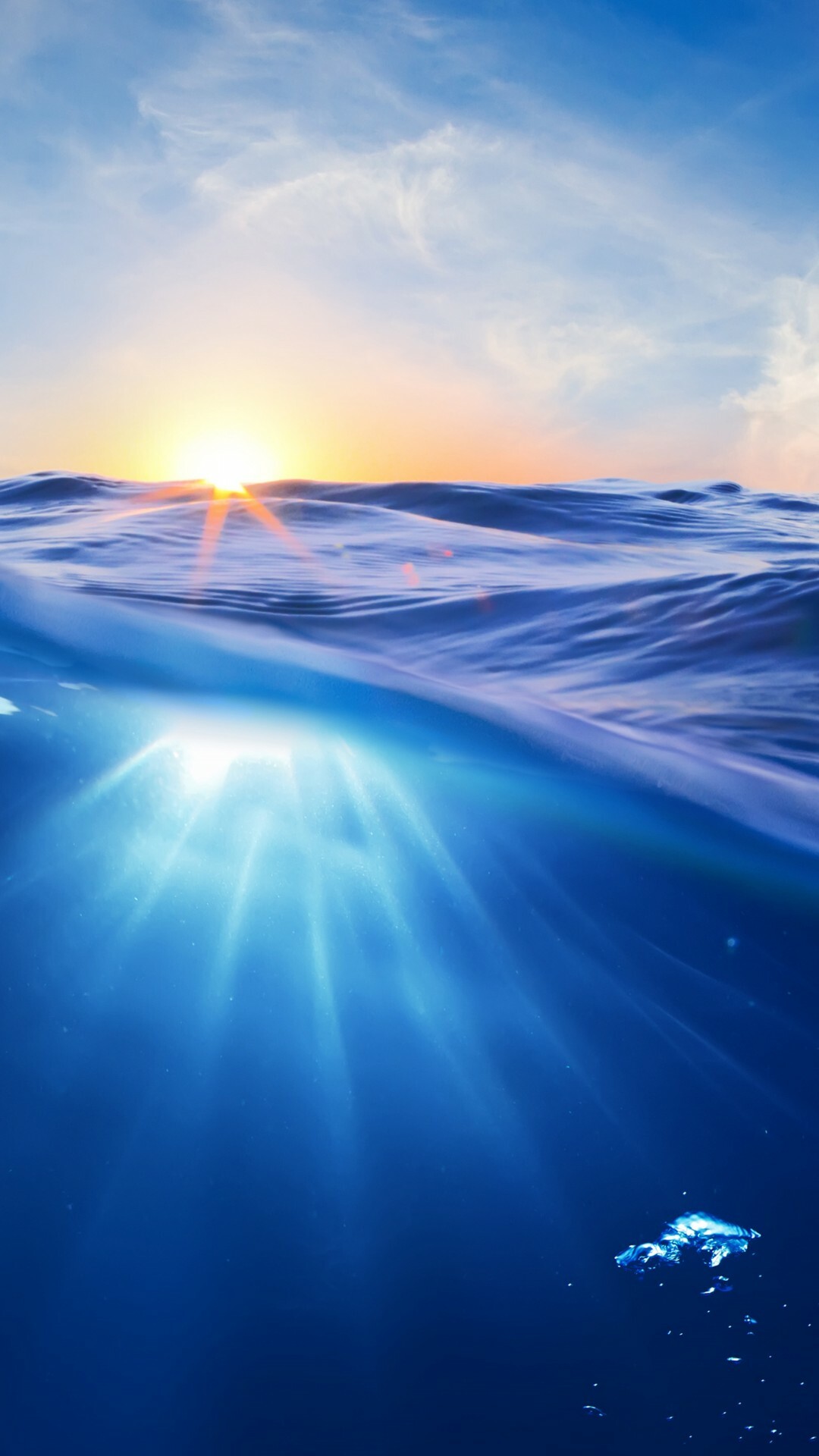 Horizon sunburst over ocean, Underwater sun rays, Split-level sea view Horizon sunburst over ocean, Underwater sun rays, Split-level sea view — 1080×1920 HD wallpaper