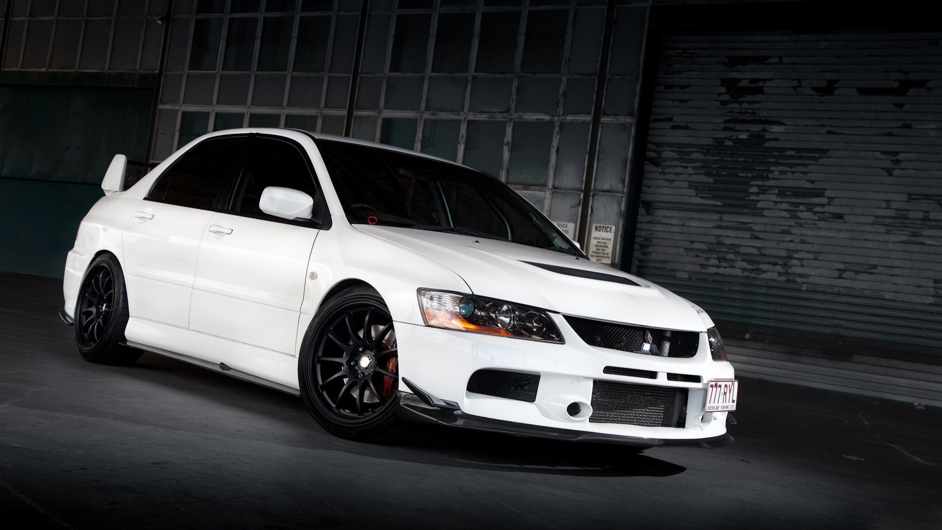 Mitsubishi Lancer Evolution IX, White sedan black wheels, Industrial warehouse interior Mitsubishi Lancer Evolution IX, White sedan black wheels, Industrial warehouse interior — 1920×1080 HD wallpaper