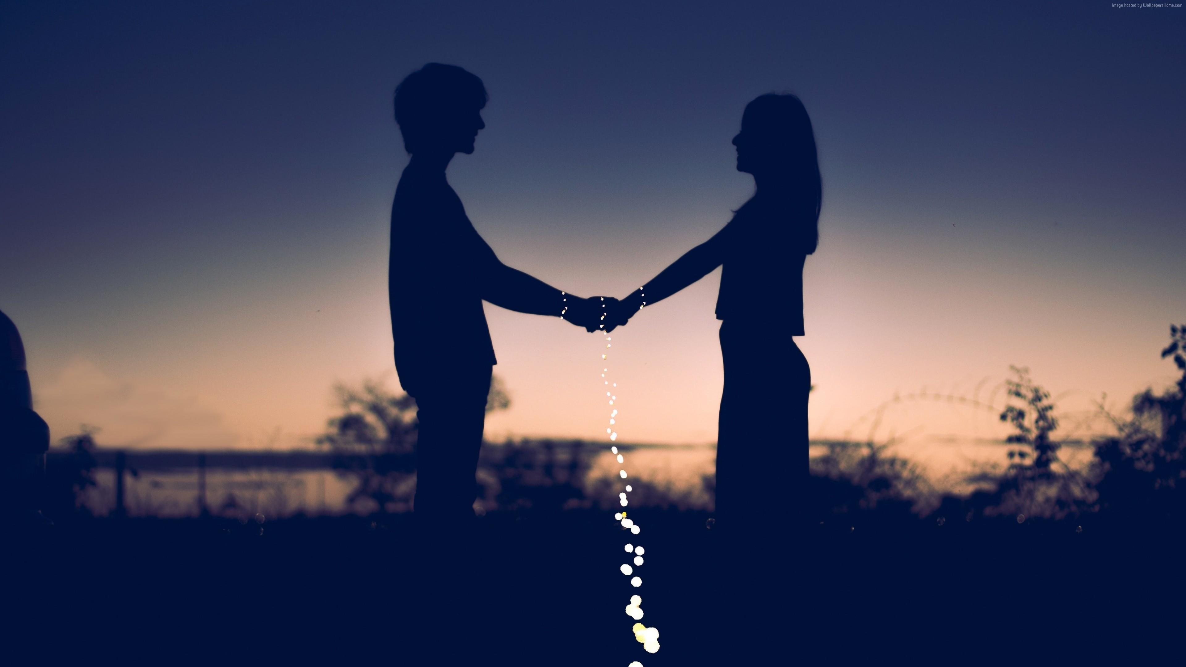 Silhouette couple holding hands, Twilight sunset horizon, Falling bokeh lights Silhouette couple holding hands, Twilight sunset horizon, Falling bokeh lights — 3840×2160 HD wallpaper
