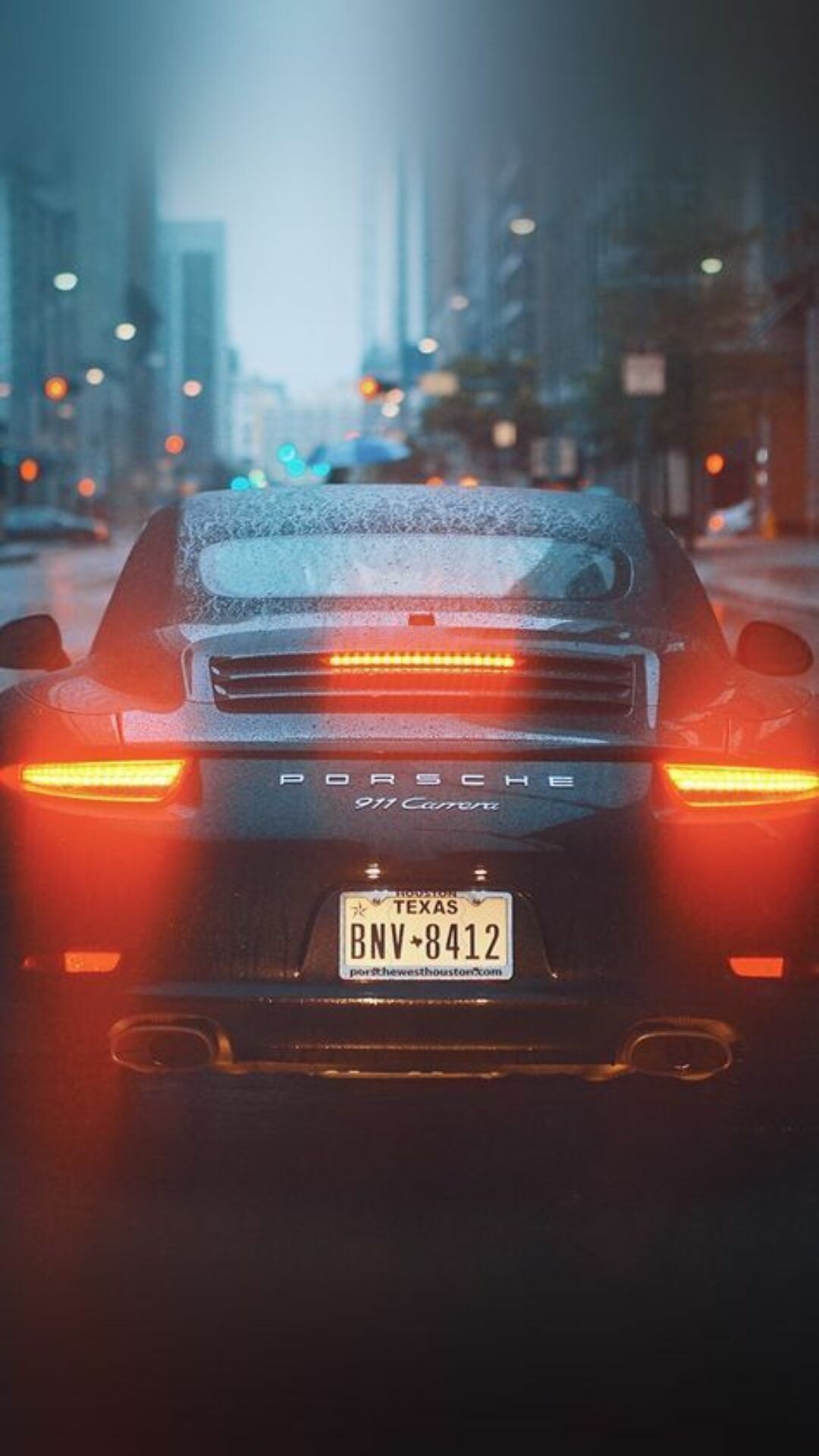 Black 911 Carrera, Rainy city street, Glowing red taillights Black 911 Carrera, Rainy city street, Glowing red taillights — 1080×1920 HD wallpaper