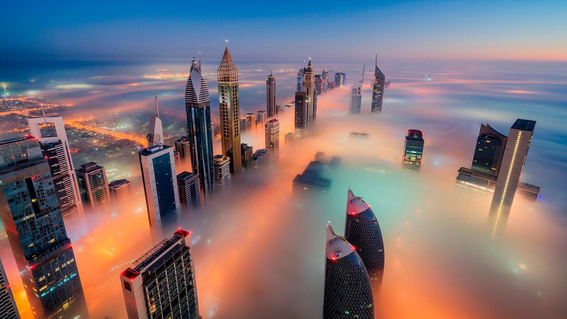 Sheikh Zayed Road towers, Dubai skyscrapers above fog, Aerial twilight cityscape Sheikh Zayed Road towers, Dubai skyscrapers above fog, Aerial twilight cityscape — 1920×1080 HD wallpaper