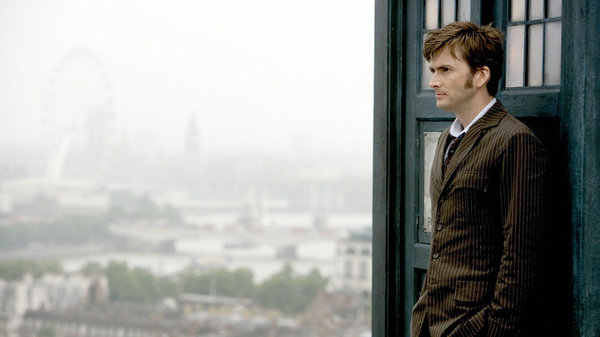 Tenth Doctor David Tennant, TARDIS doorway, London Eye skyline, Big Ben mist Tenth Doctor David Tennant, TARDIS doorway, London Eye skyline, Big Ben mist — 1920×1080 HD wallpaper