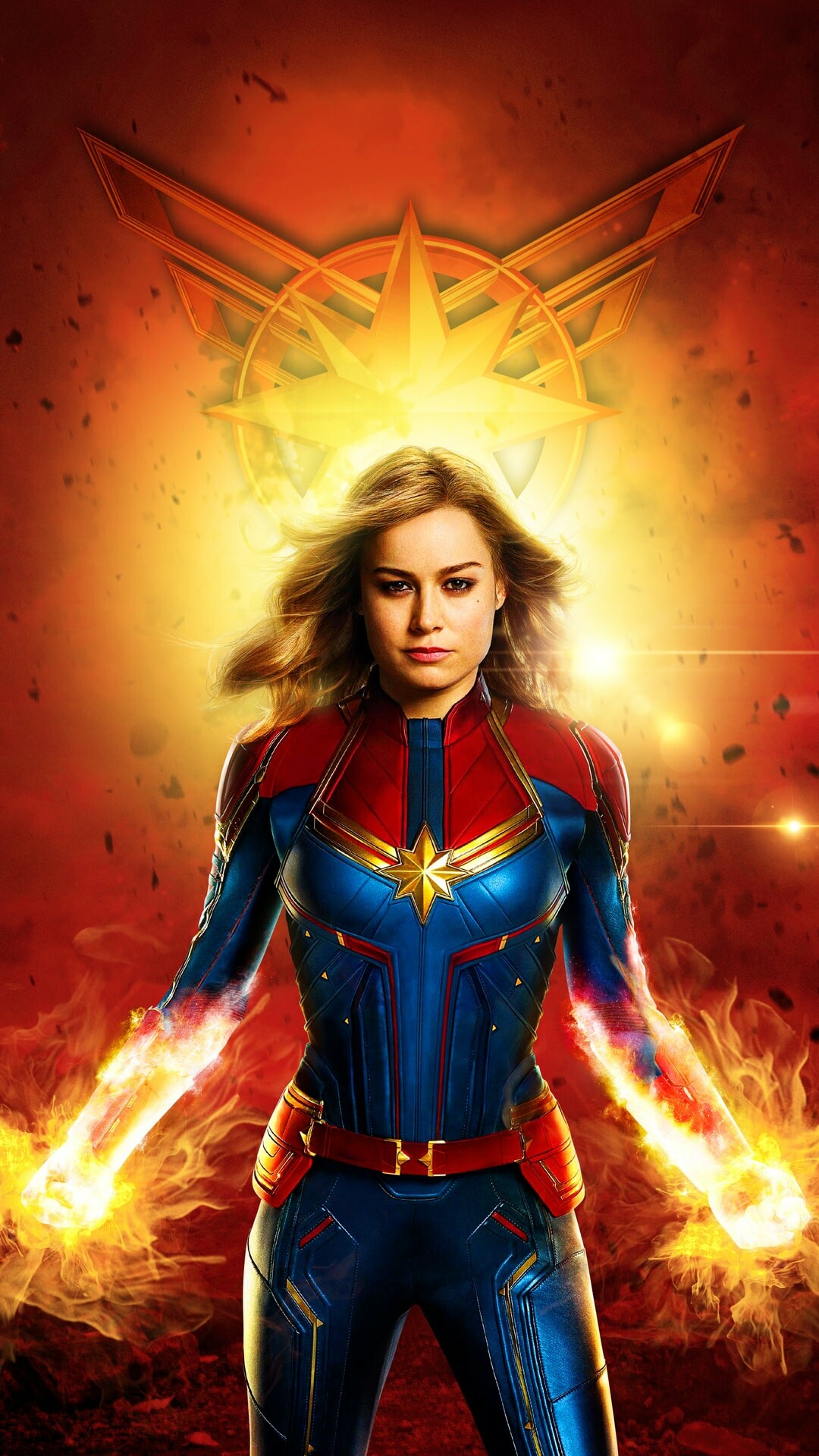 Brie Larson Captain Marvel, Hala star emblem, Flaming photon fists, Fiery red backdrop Brie Larson Captain Marvel, Hala star emblem, Flaming photon fists, Fiery red backdrop — 1080×1920 HD wallpaper