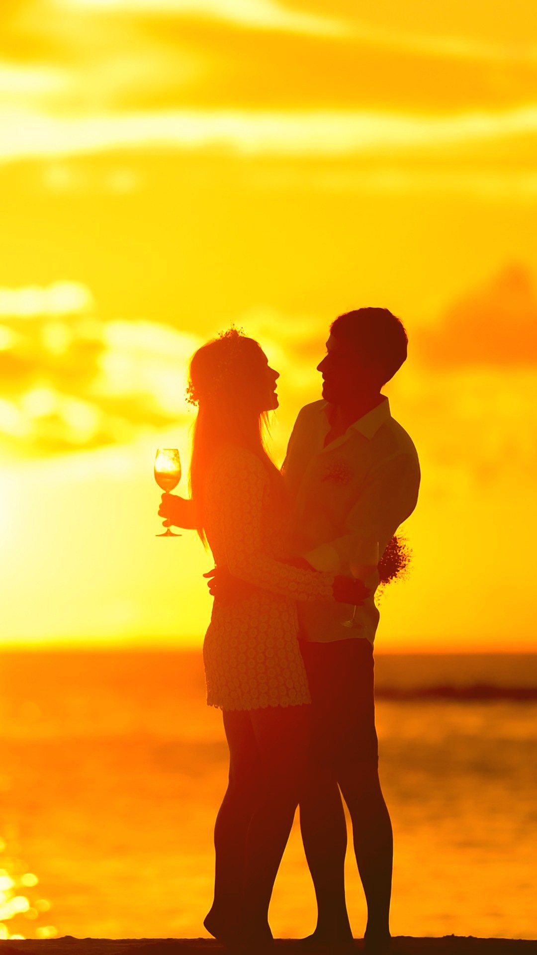 Couple embracing beach silhouette, Golden sunset sea, Woman holding wine glass Couple embracing beach silhouette, Golden sunset sea, Woman holding wine glass — 1080×1920 HD wallpaper