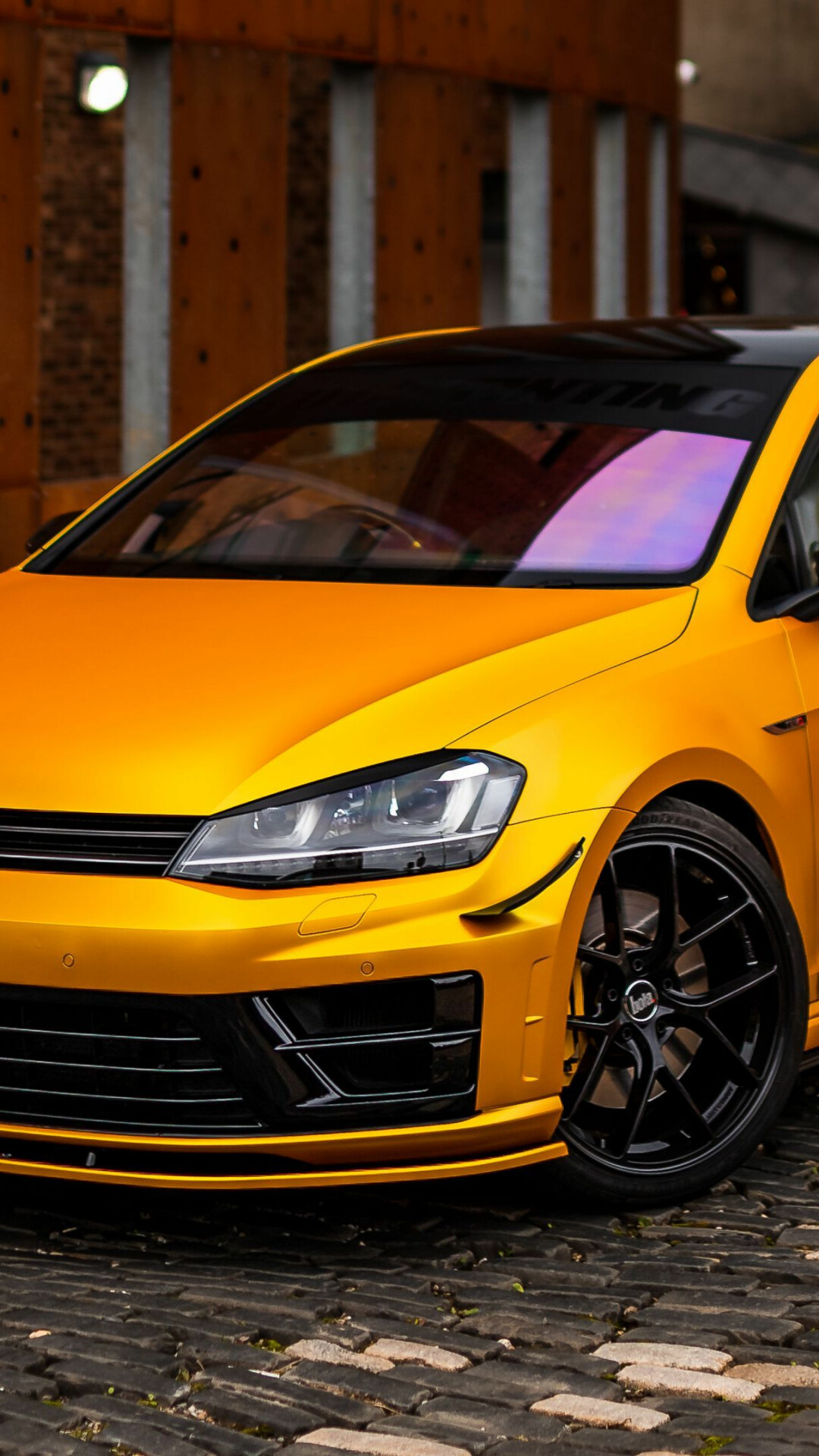 Volkswagen Golf R, Matte yellow wrap, Cobblestone street Volkswagen Golf R, Matte yellow wrap, Cobblestone street — 1080×1920 HD wallpaper