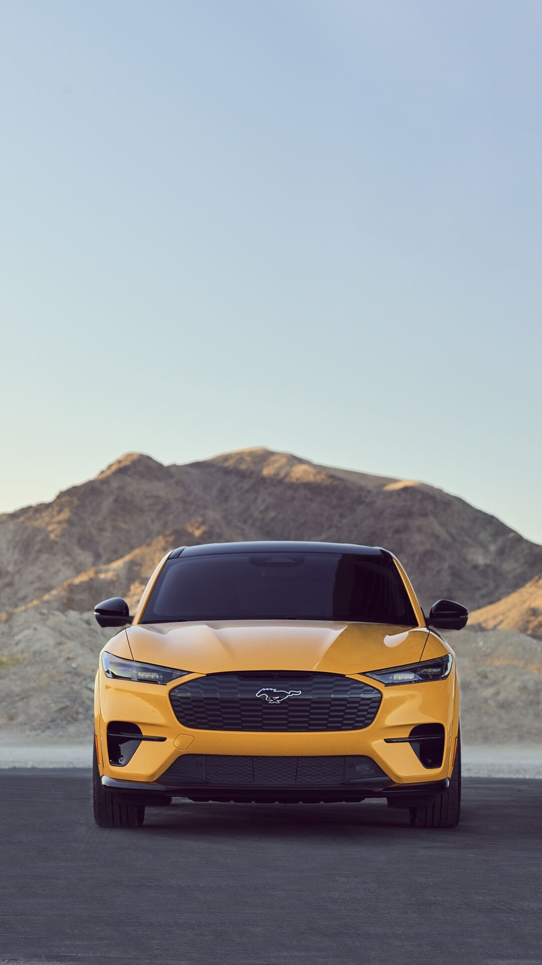 Ford Mustang Mach-E, Desert mountain backdrop, Yellow SUV front Ford Mustang Mach-E, Desert mountain backdrop, Yellow SUV front — 1080×1920 HD wallpaper