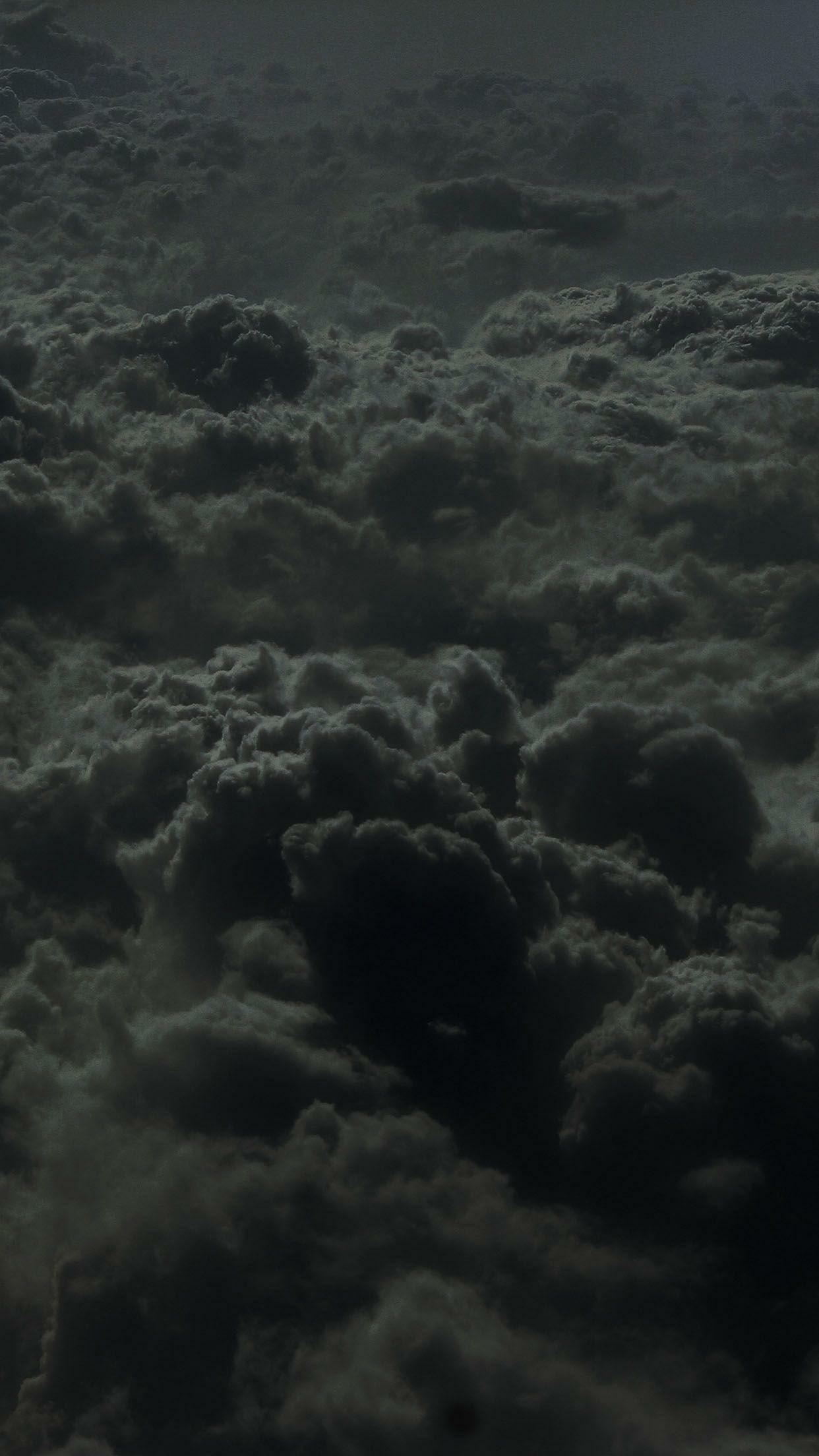 Dark cumulus cloudscape, Aerial cloud view, Grey tones Dark cumulus cloudscape, Aerial cloud view, Grey tones — 1242×2208 HD wallpaper