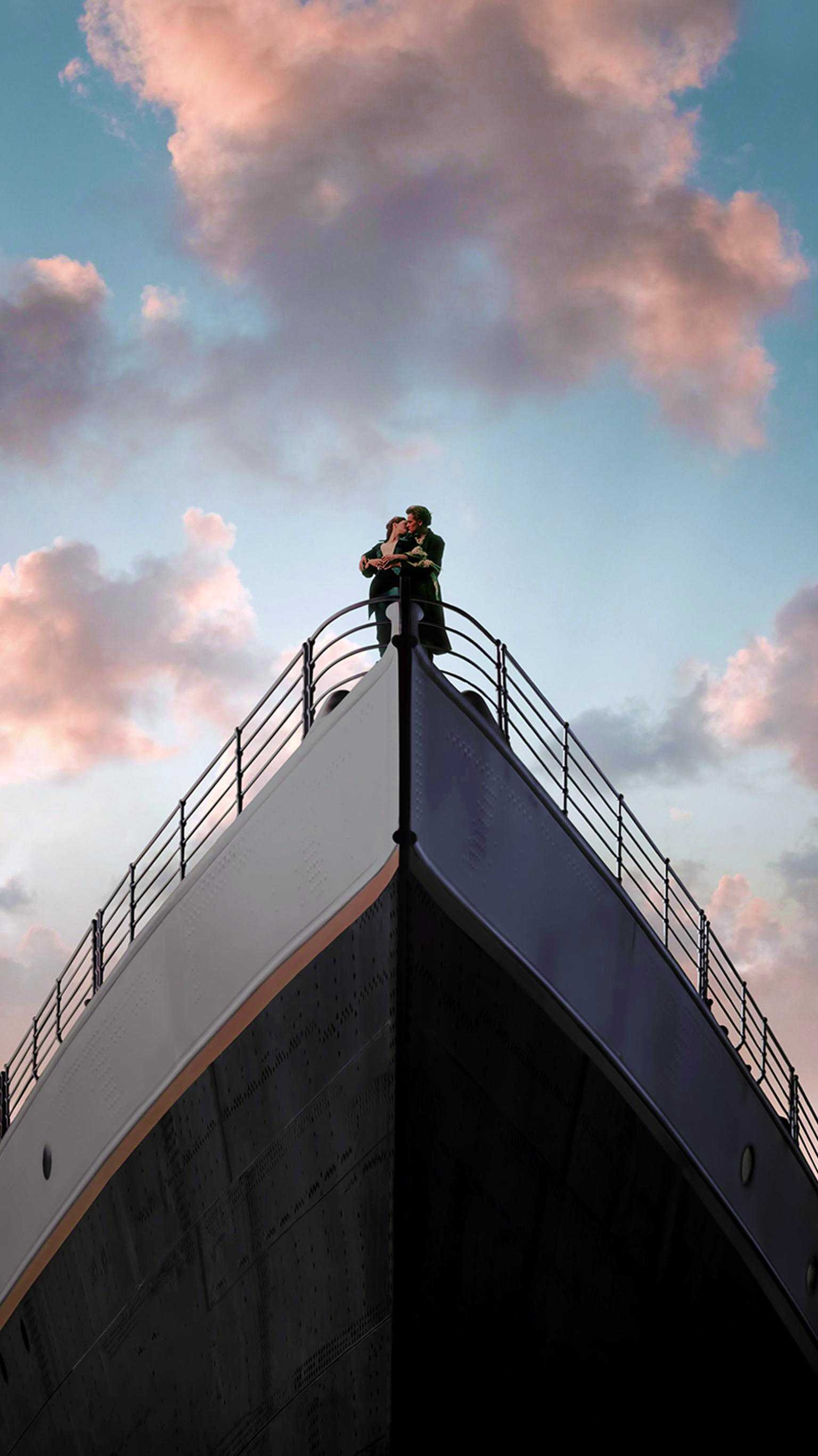 Jack and Rose embrace, Titanic ship bow, Pink cloudy sky Jack and Rose embrace, Titanic ship bow, Pink cloudy sky — 1536×2732 HD wallpaper