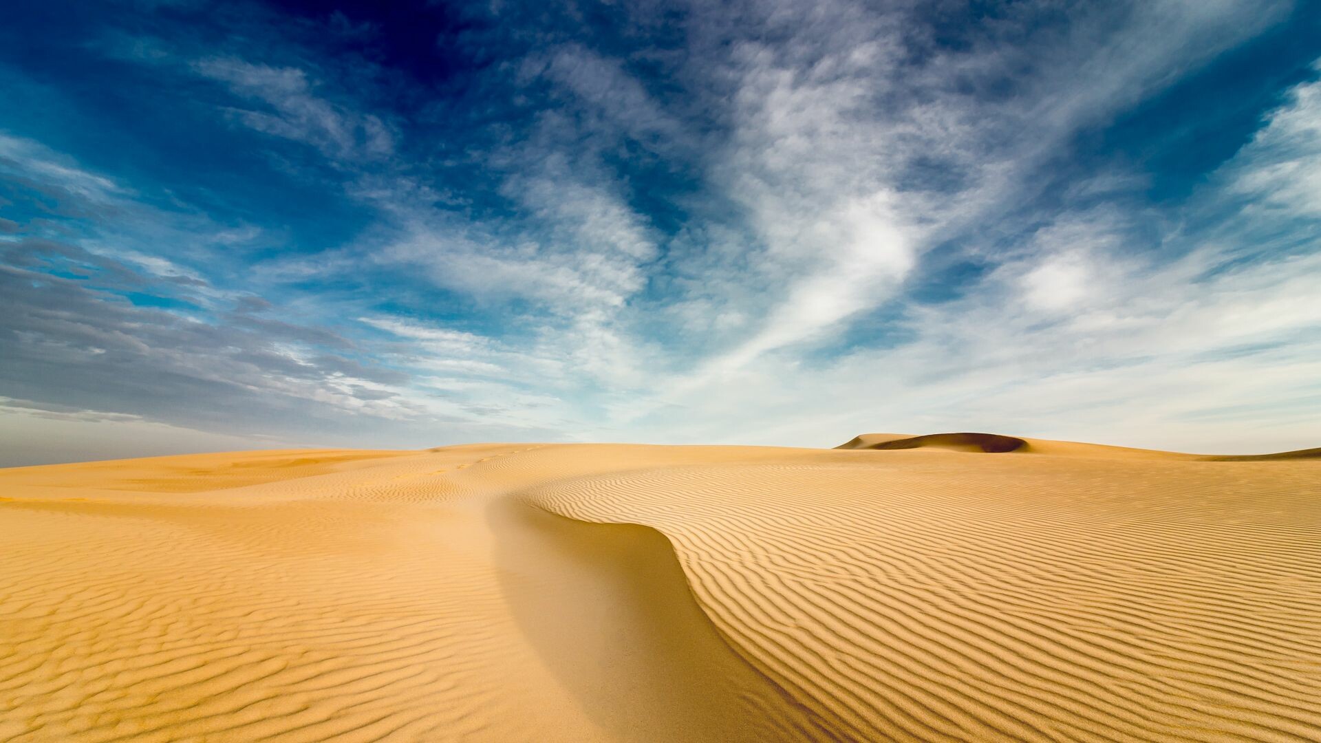 Rippled sand dunes, Wispy cirrus clouds, Golden desert horizon Rippled sand dunes, Wispy cirrus clouds, Golden desert horizon — 1920×1080 HD wallpaper
