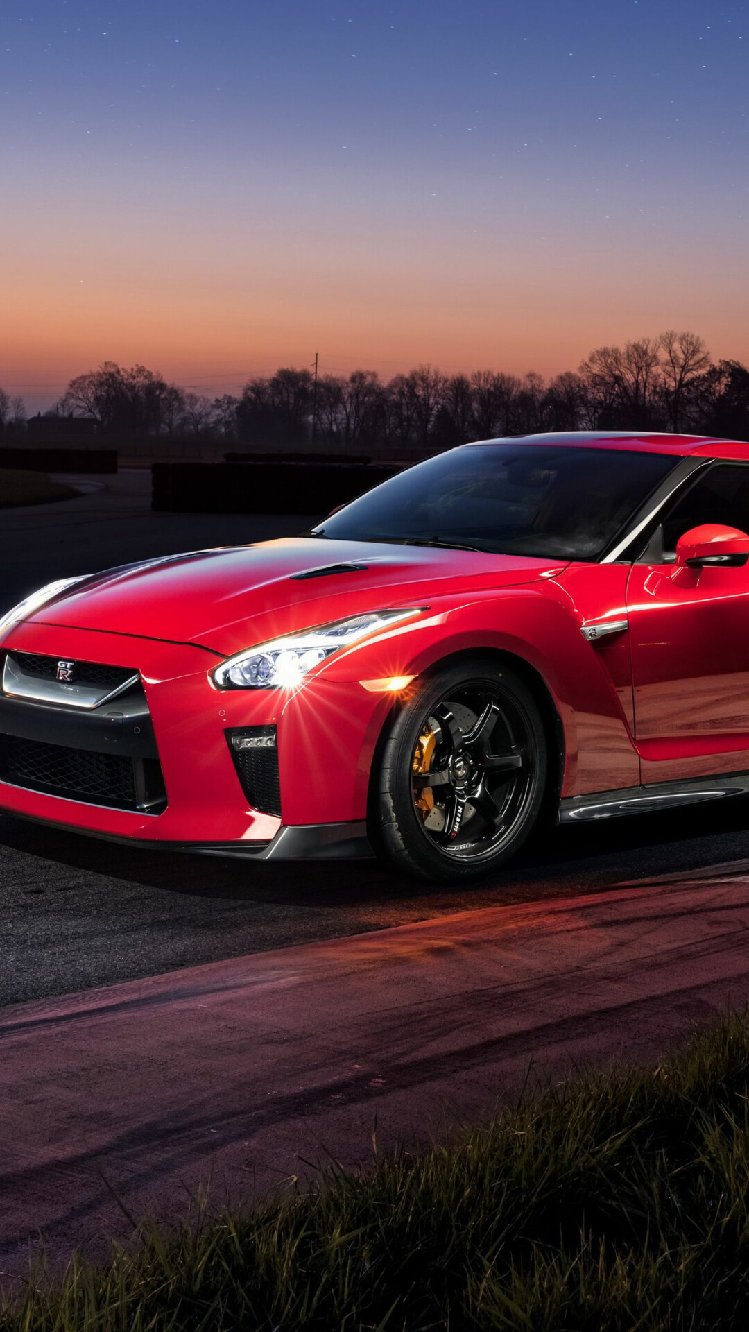 Nissan GT-R, Red coupe, Sunset horizon silhouette, Black alloy wheels Nissan GT-R, Red coupe, Sunset horizon silhouette, Black alloy wheels — 1080×1920 HD wallpaper