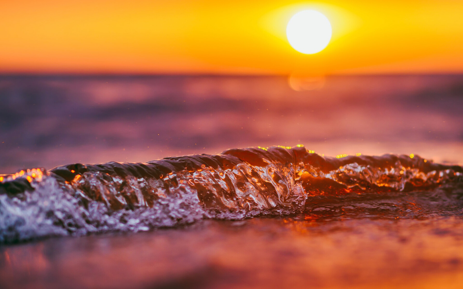 Backlit breaking wave, Orange sunset sky, Bright sun over sea Backlit breaking wave, Orange sunset sky, Bright sun over sea — 1920×1200 HD wallpaper