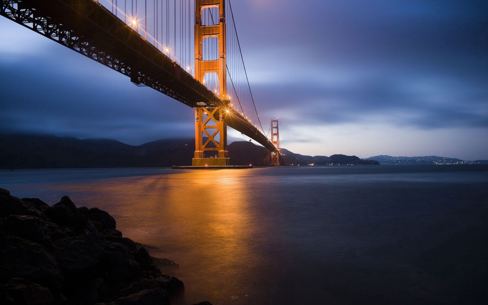 Golden Gate Bridge, Illuminated bridge tower dusk, Rocky shoreline bay Golden Gate Bridge, Illuminated bridge tower dusk, Rocky shoreline bay — 1920×1200 HD wallpaper
