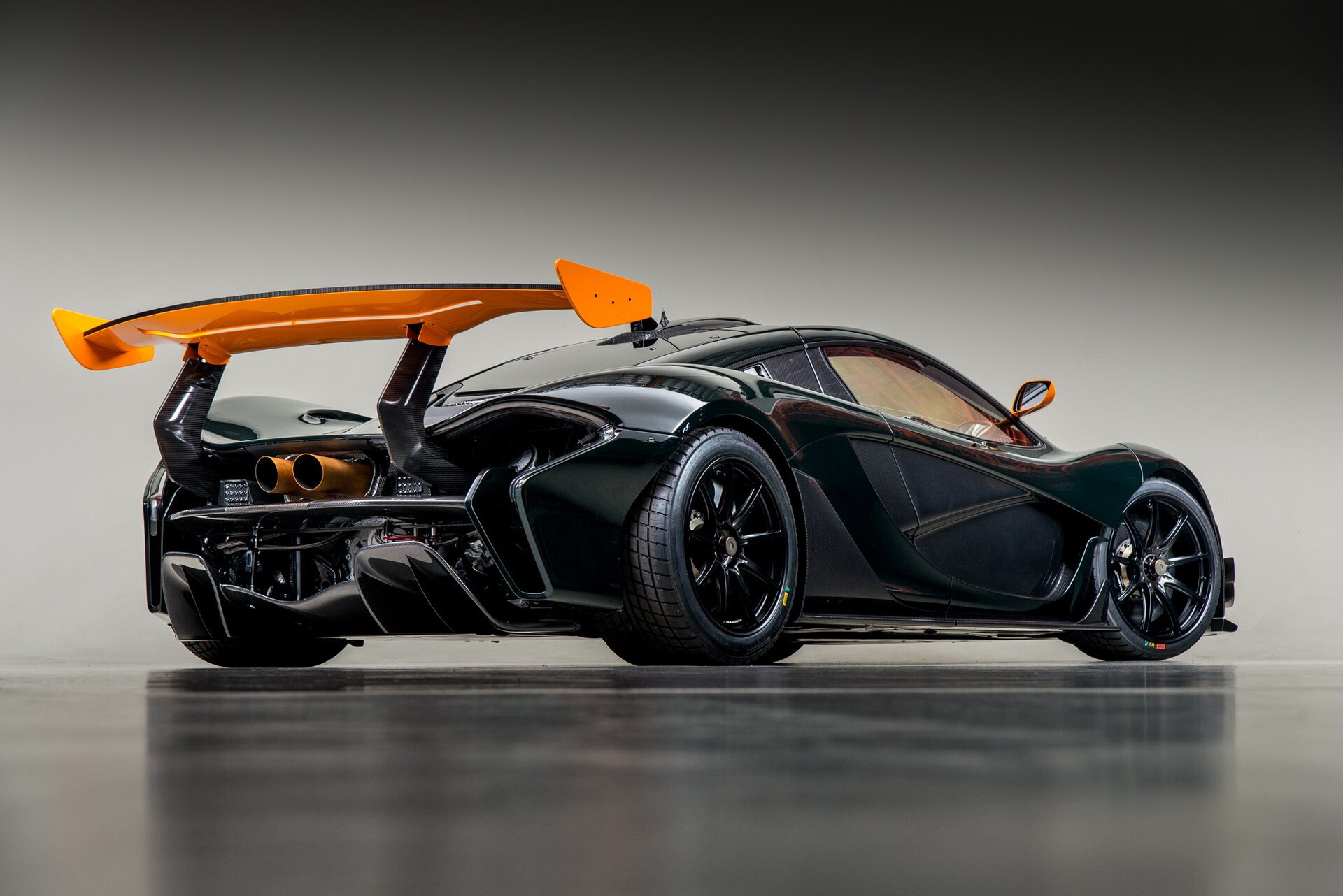 McLaren P1 GTR, Orange rear wing, Dark green hypercar McLaren P1 GTR, Orange rear wing, Dark green hypercar — 1920×1282 HD wallpaper