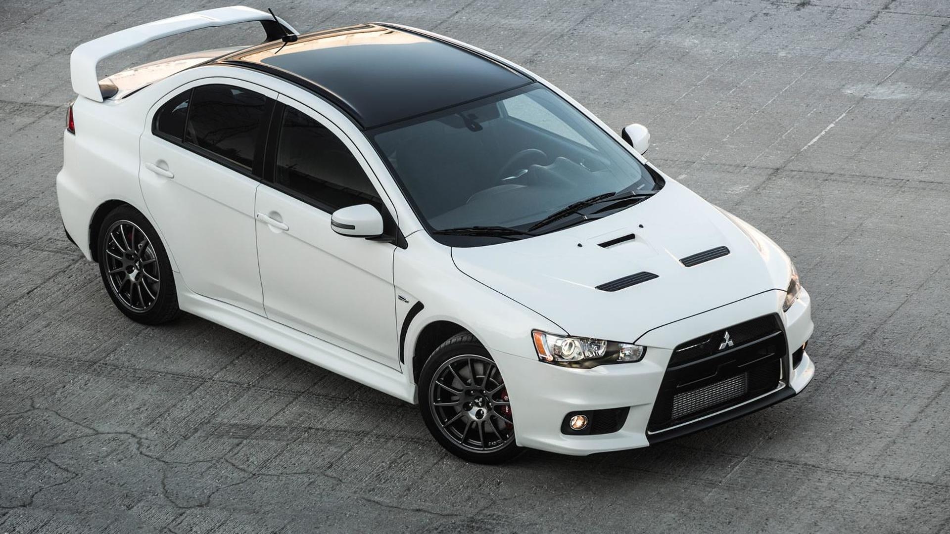 Mitsubishi Lancer Evolution X, White sedan rear spoiler, Cracked concrete pavement Mitsubishi Lancer Evolution X, White sedan rear spoiler, Cracked concrete pavement — 1920×1080 HD wallpaper